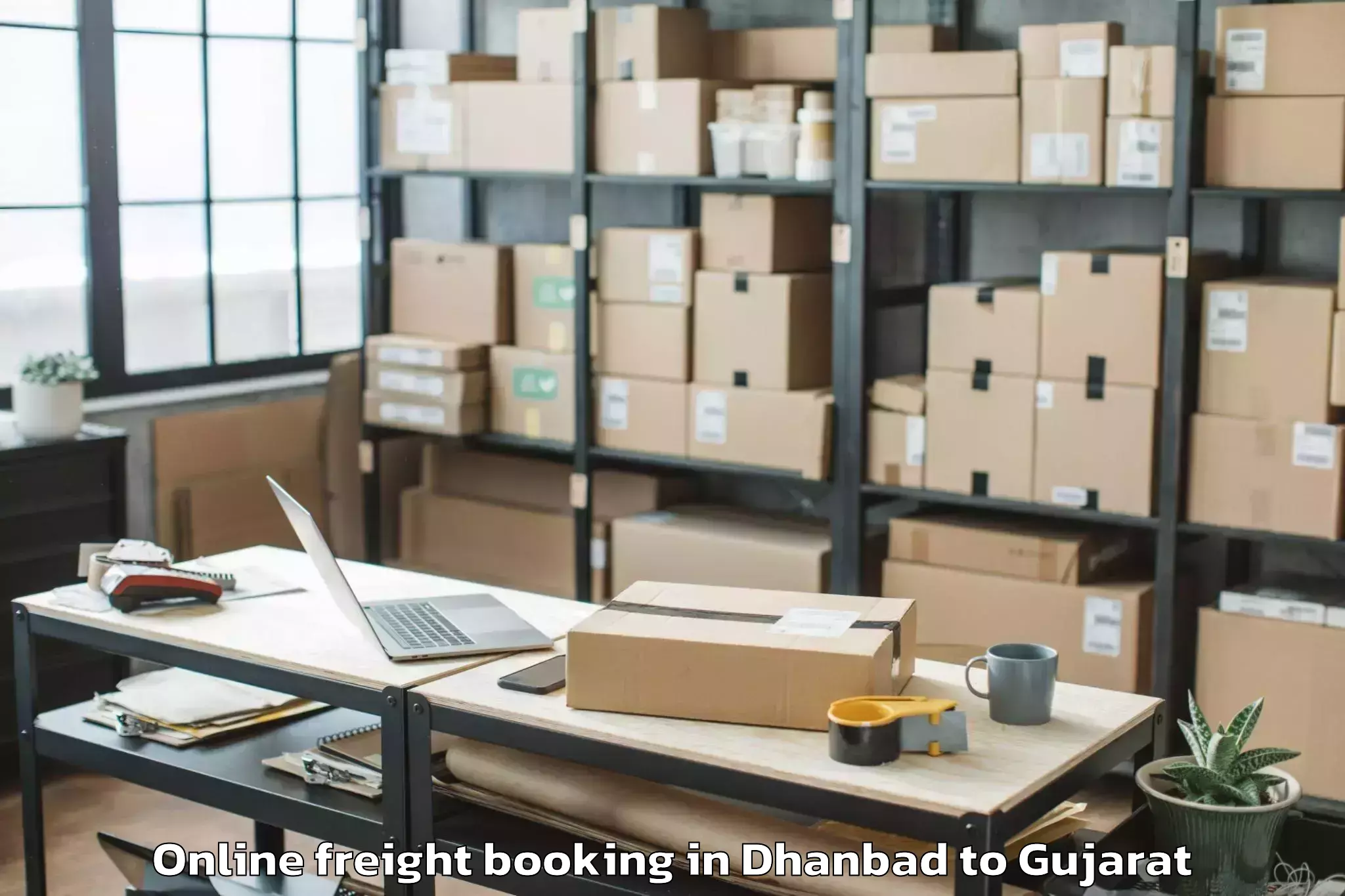 Trusted Dhanbad to Iiit Surat Online Freight Booking